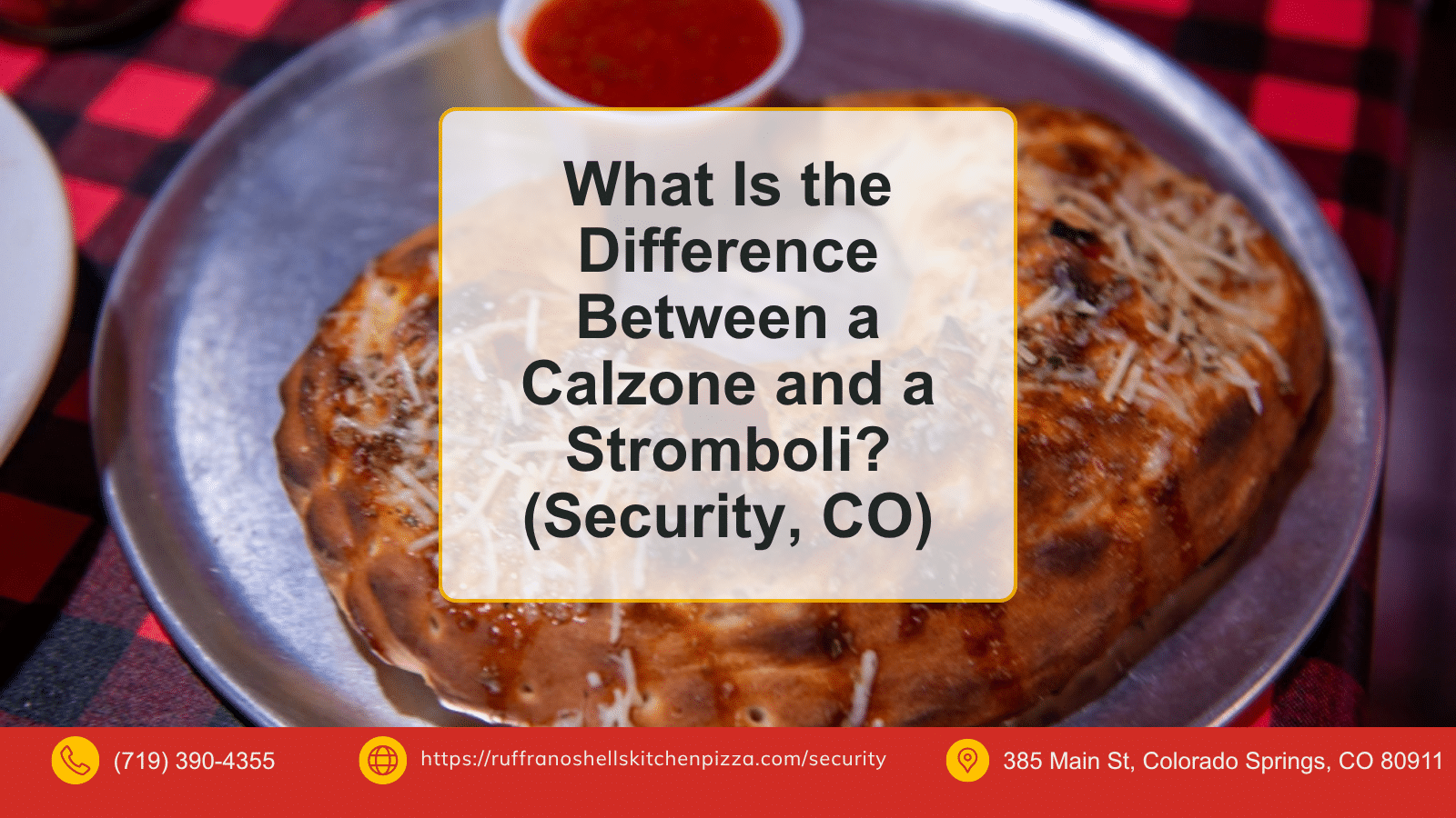 Golden baked calzone with a cup of marinara on a metal tray, with the title What Is the Difference Between a Calzone and a Stromboli, Security, CO